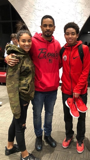 A picture of Amai with her dad and younger brother Shawn.